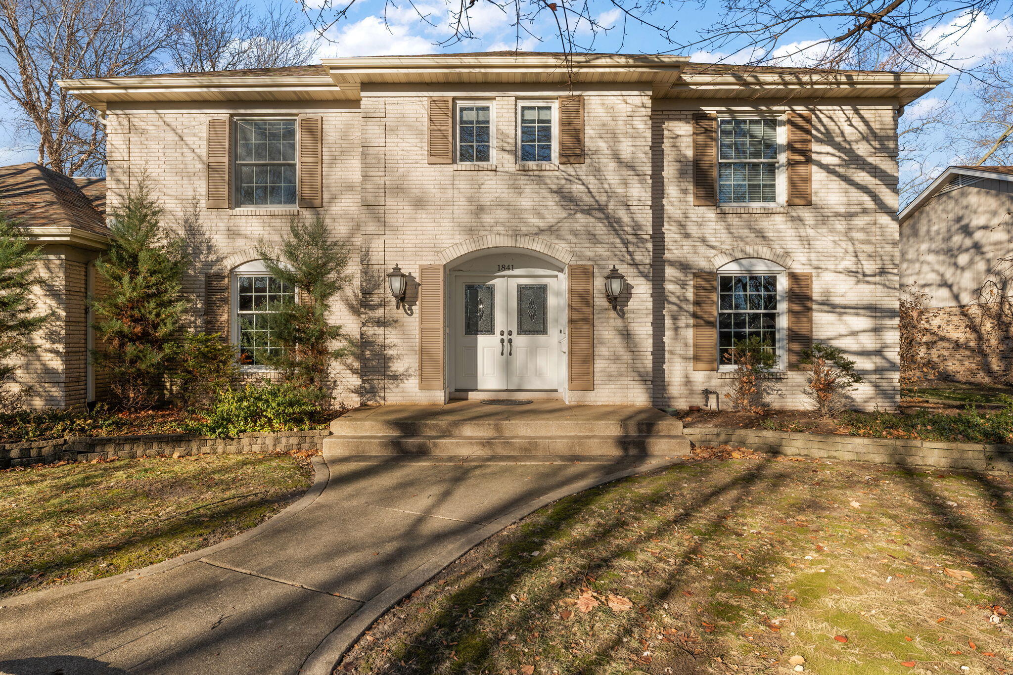 1841 Lambert Lane Munster, IN 46321 - Photo 5 of 66 a front view of a house with a yard
