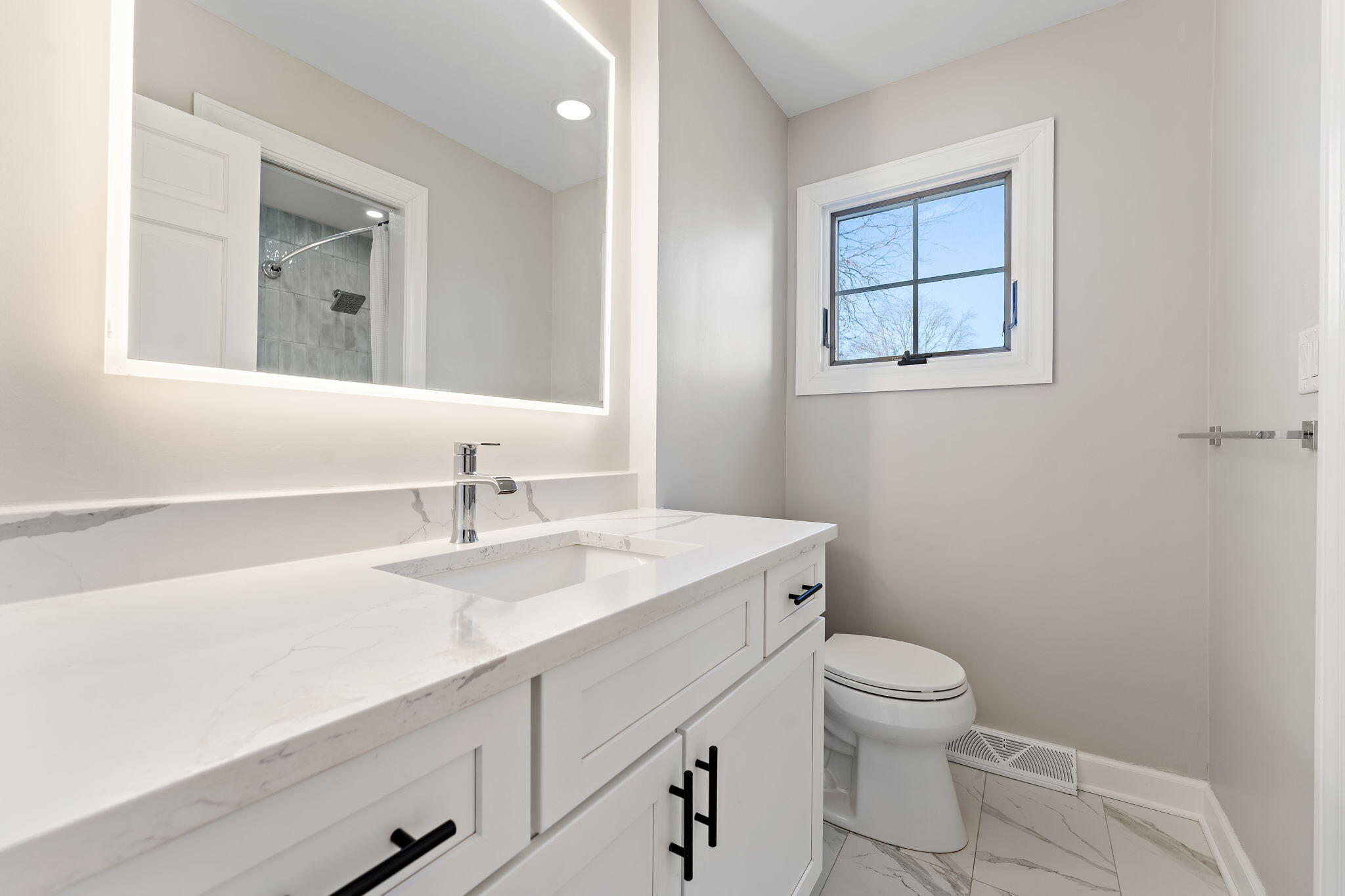 1841 Lambert Lane Munster, IN 46321 - Photo 54 of 66 a bathroom with a sink toilet and vanity
