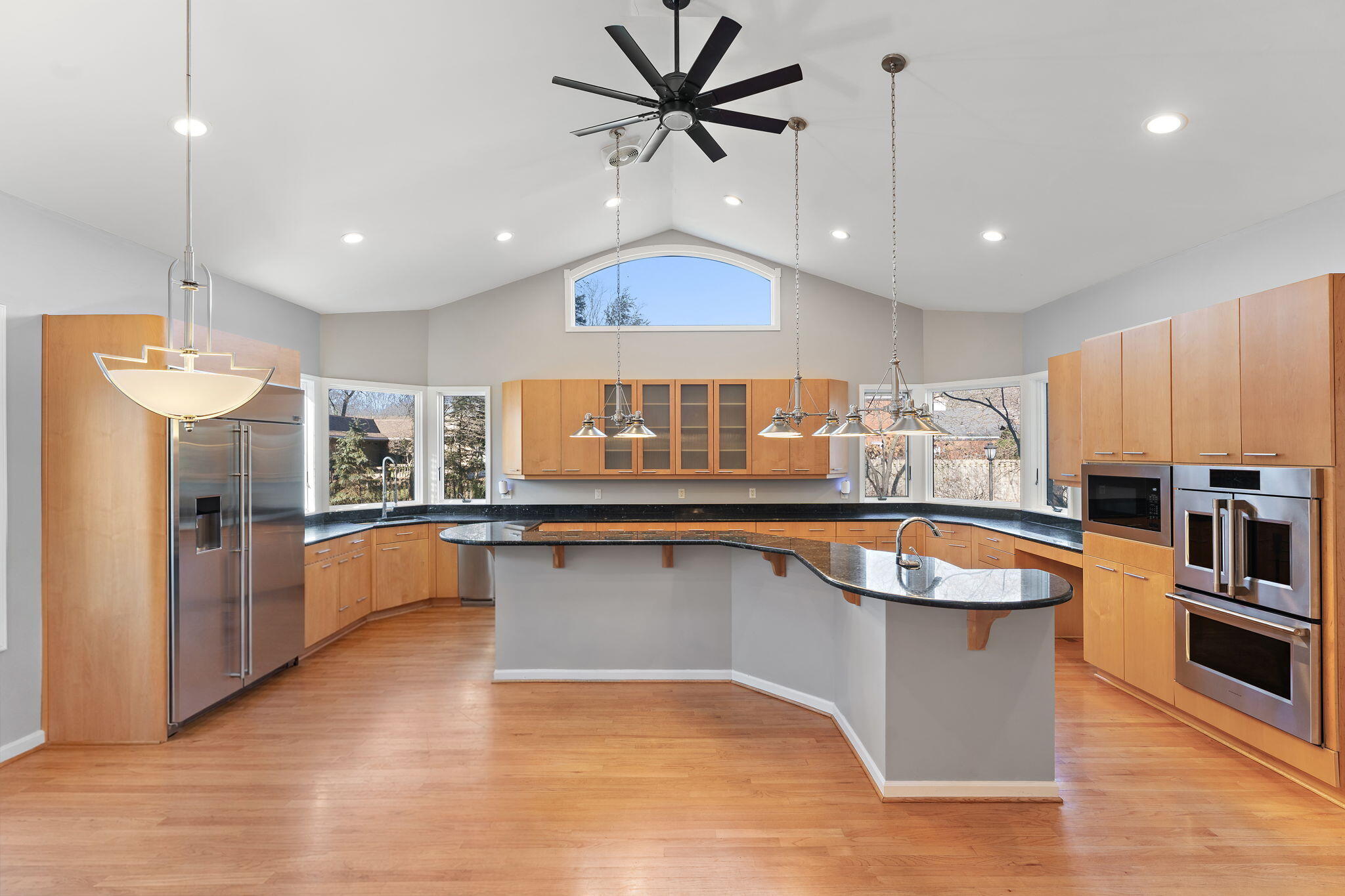 1841 Lambert Lane Munster, IN 46321 - Photo 10 of 66 a kitchen with stainless steel appliances granite countertop a sink a stove and a wooden floors