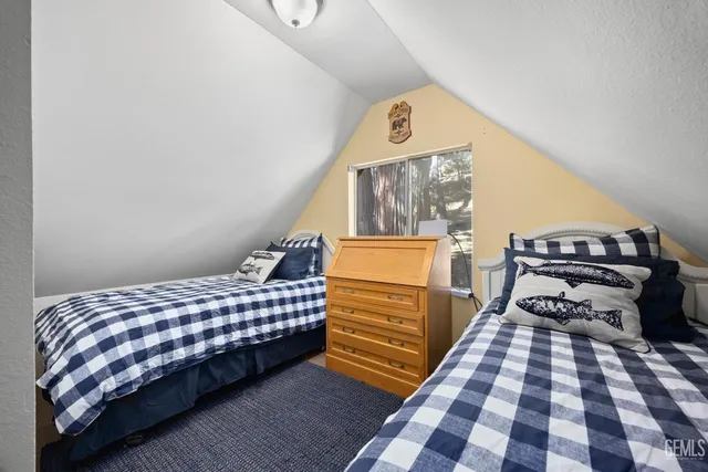 a view of a storage & utility room with a washer dryer