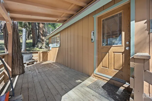 a living room with furniture fireplace and a flat screen tv