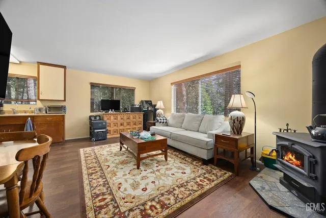 a kitchen with stainless steel appliances a stove sink and cabinets