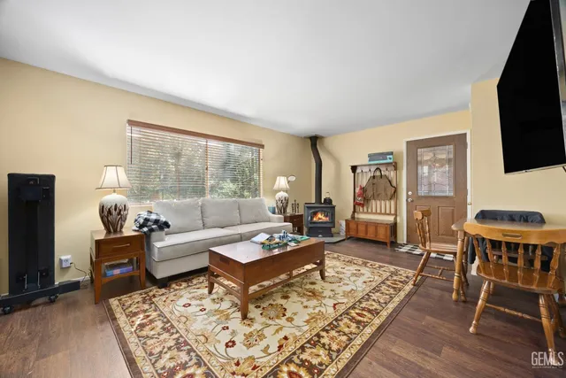 a kitchen with stainless steel appliances a stove sink and cabinets