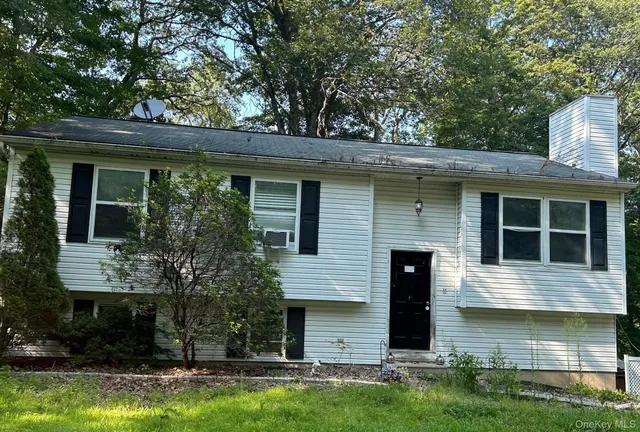front view of house with a yard