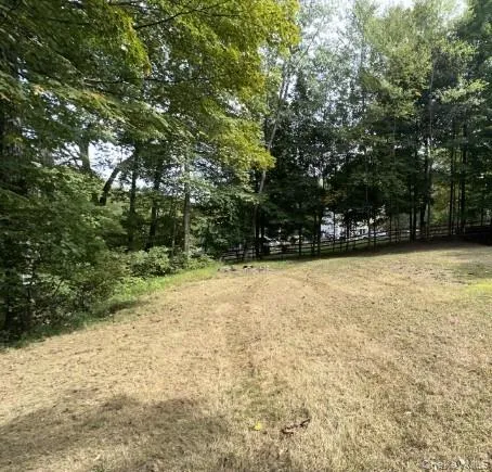 a view of swimming pool with trees