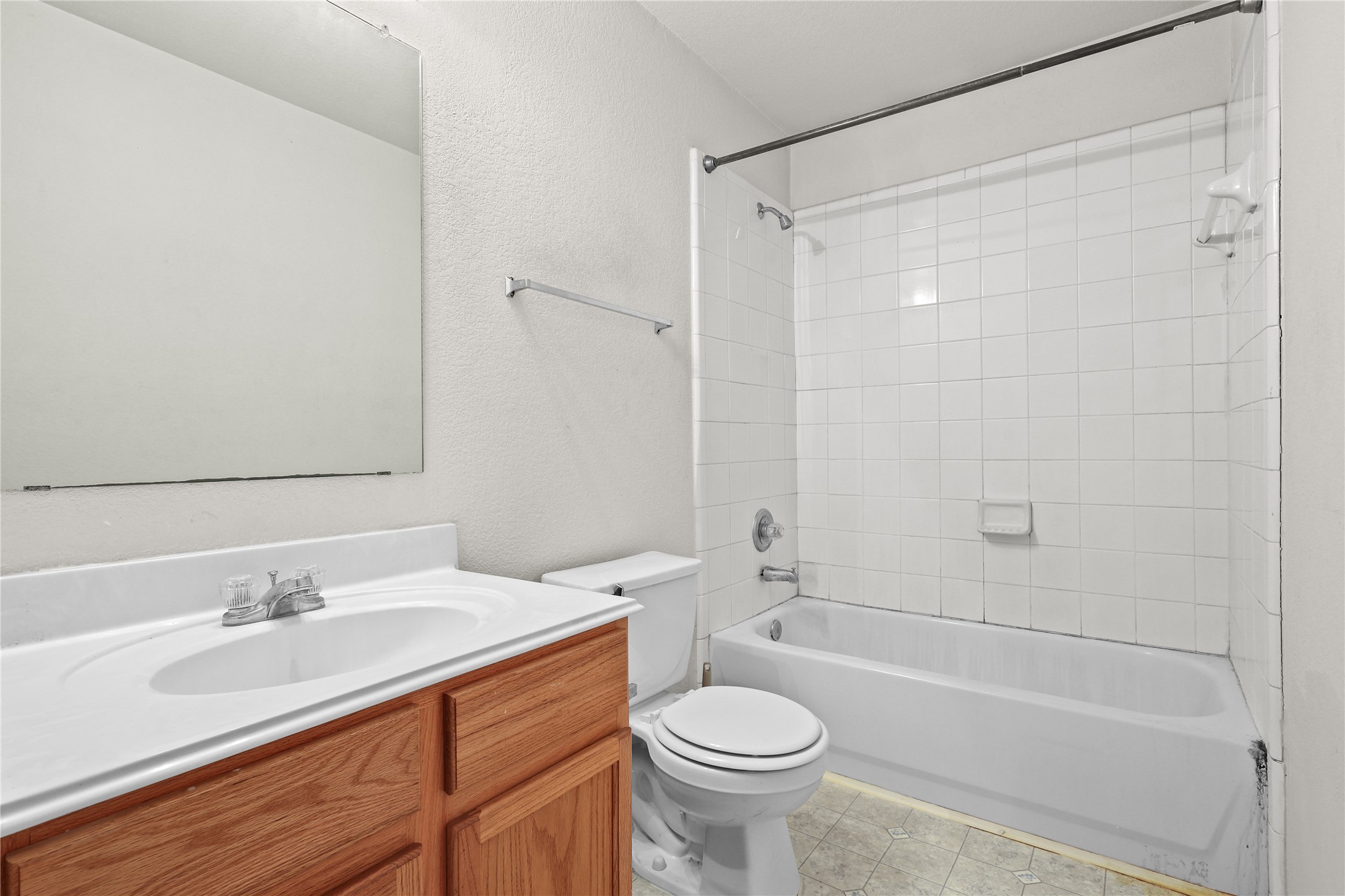 3743 Brighton Springs Lane Katy, TX 77449 - Photo 16 of 40 a bathroom with a sink a toilet and shower