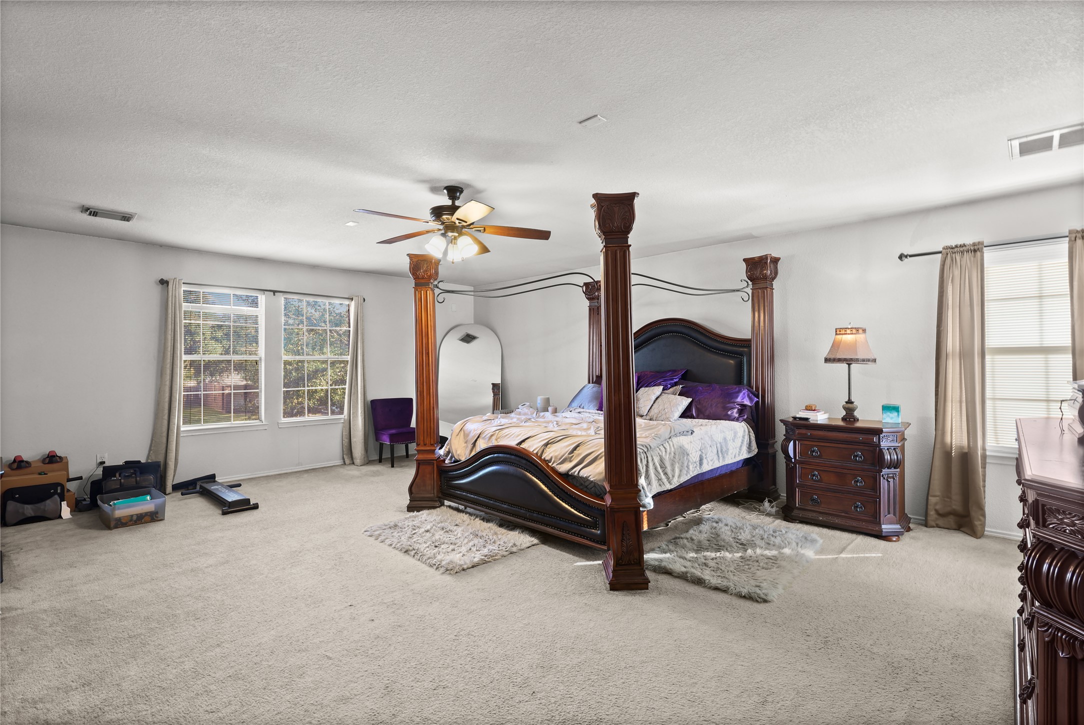 3743 Brighton Springs Lane Katy, TX 77449 - Photo 17 of 40 a bedroom with a bed and a window