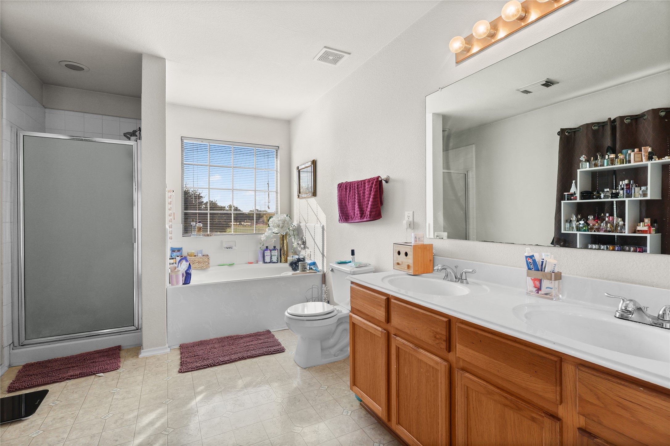 3743 Brighton Springs Lane Katy, TX 77449 - Photo 19 of 40 a bathroom with a sink toilet and shower