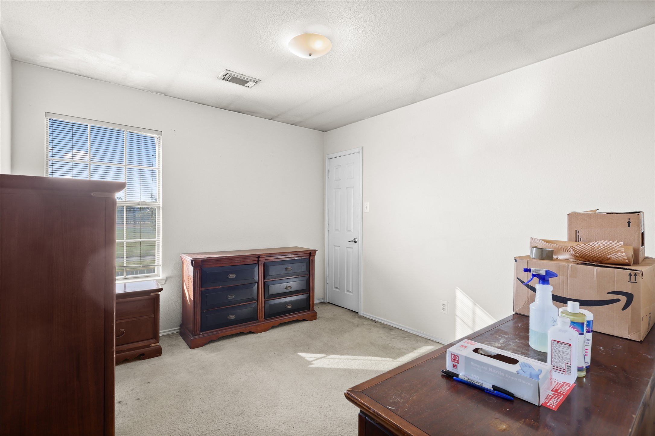 3743 Brighton Springs Lane Katy, TX 77449 - Photo 21 of 40 a room with furniture and gym equipment