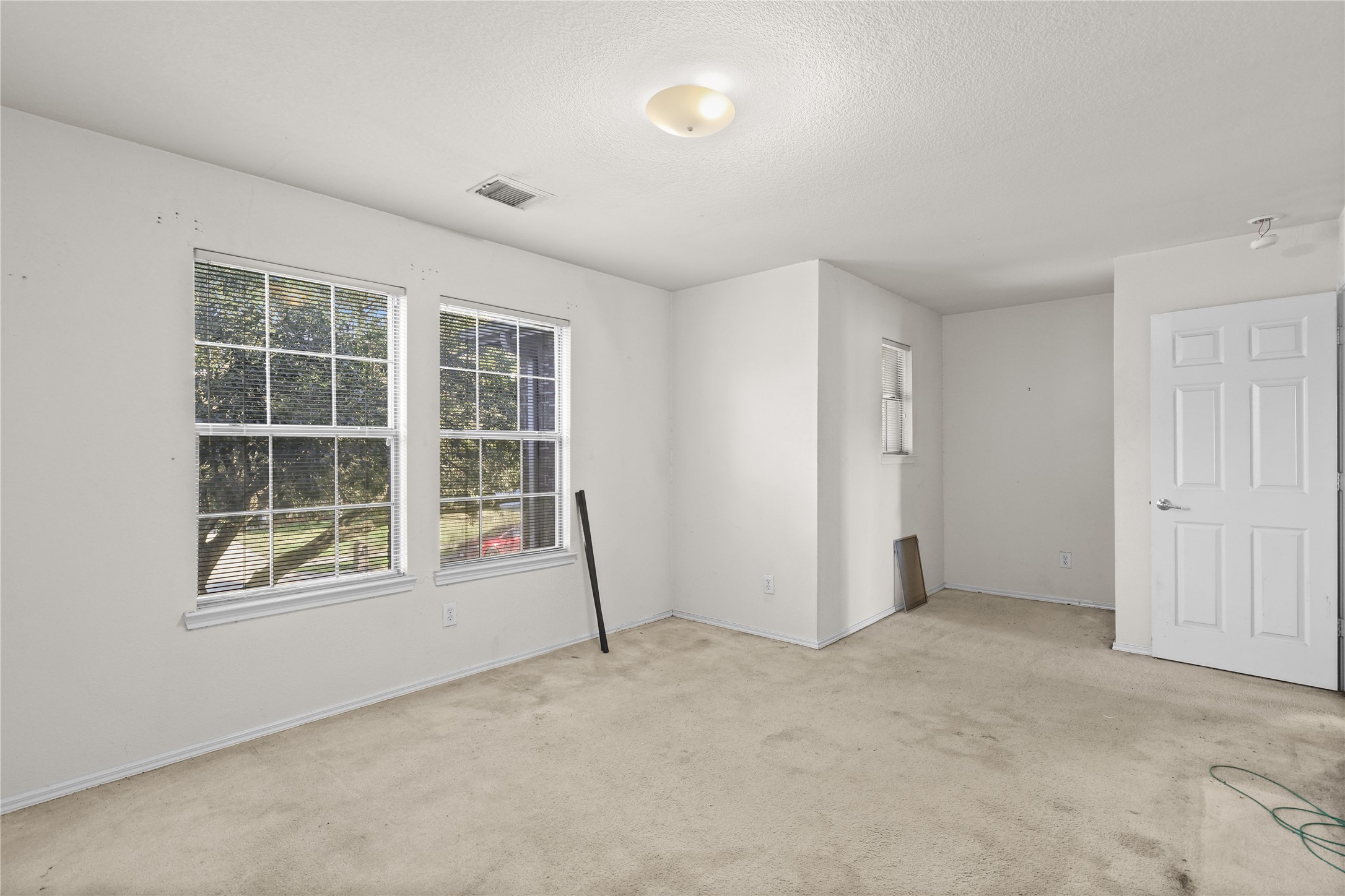 3743 Brighton Springs Lane Katy, TX 77449 - Photo 26 of 40 an empty room with windows