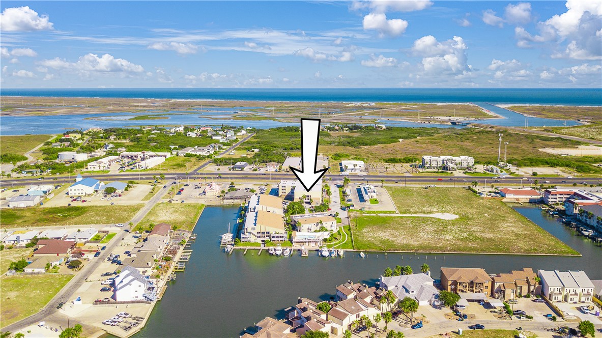 14300 South Padre Island Drive, Unit 16 Corpus Christi, TX 78418 - Photo 15 of 20 a view of an ocean and beach