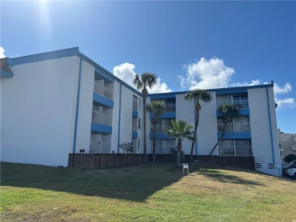 a view of pool table and chairs