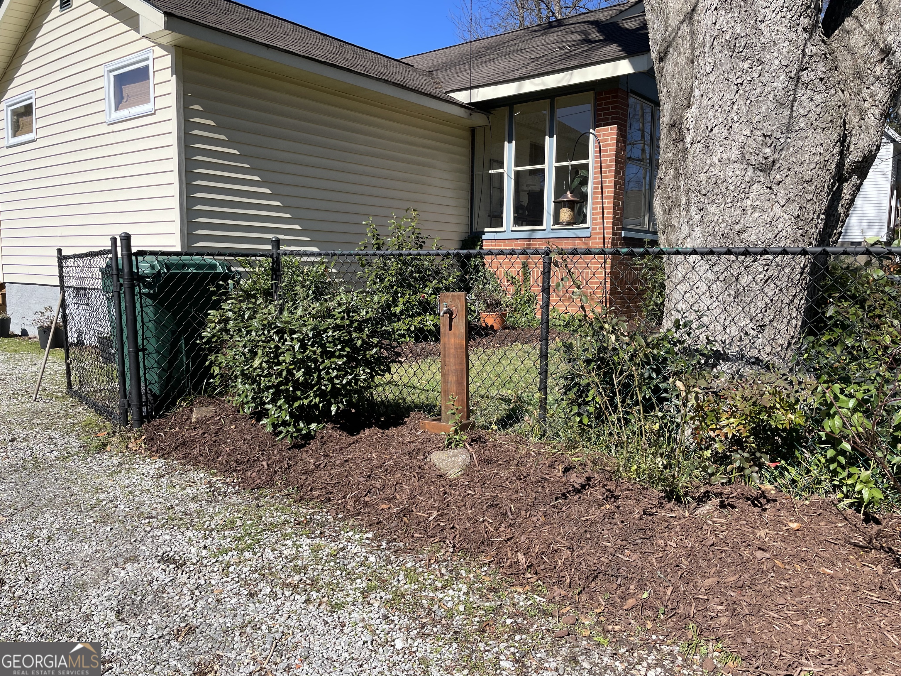200 South Jackson Street Hartwell, GA 30643 - Photo 1 of 26 a view of a backyard with plants