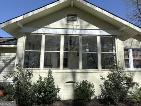 200 South Jackson Street Hartwell, GA 30643 - Photo 18 of 26 a view of a swimming pool with a bench