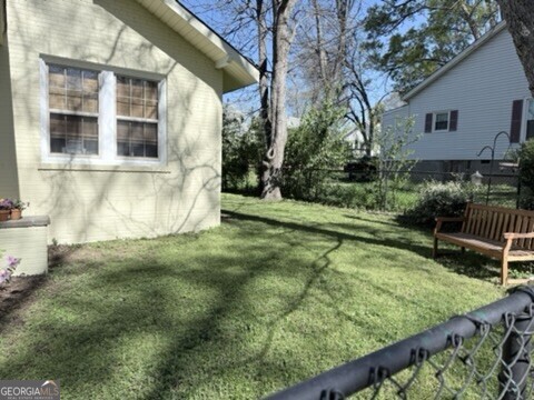200 South Jackson Street Hartwell, GA 30643 - Photo 23 of 26 a view of a house with backyard and sitting area