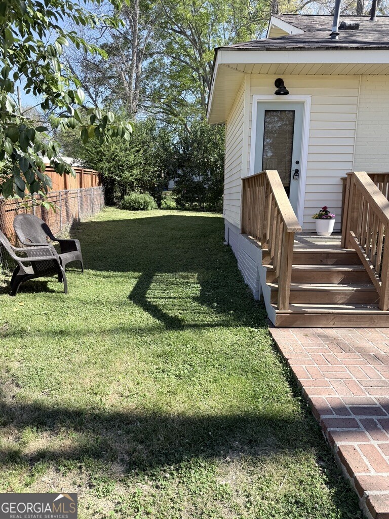 200 South Jackson Street Hartwell, GA 30643 - Photo 26 of 26 a view of backyard with swimming pool and outdoor seating