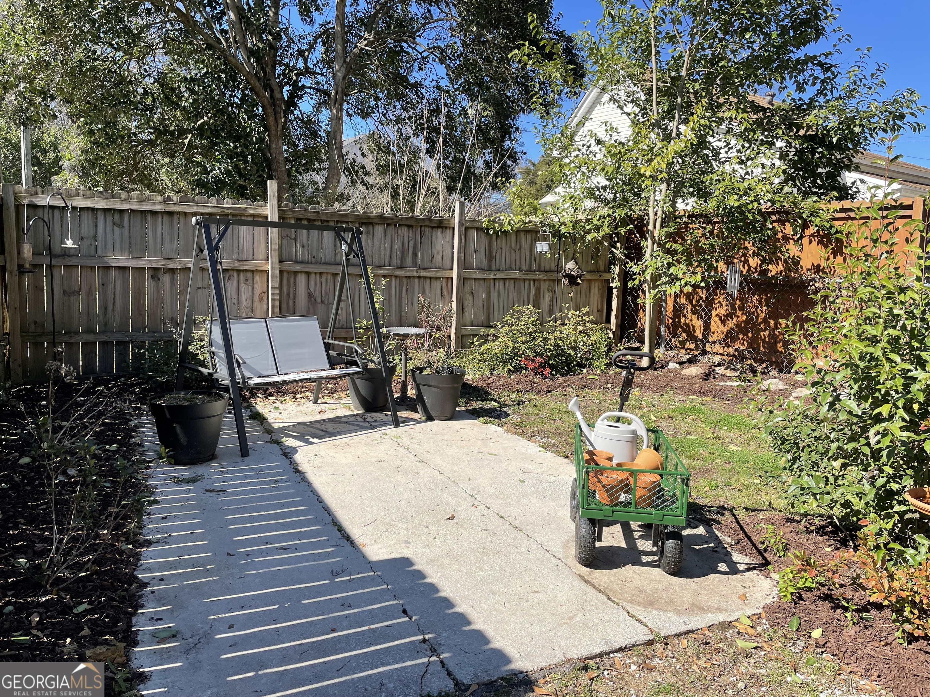 200 South Jackson Street Hartwell, GA 30643 - Photo 3 of 26 a view of a backyard with sitting area