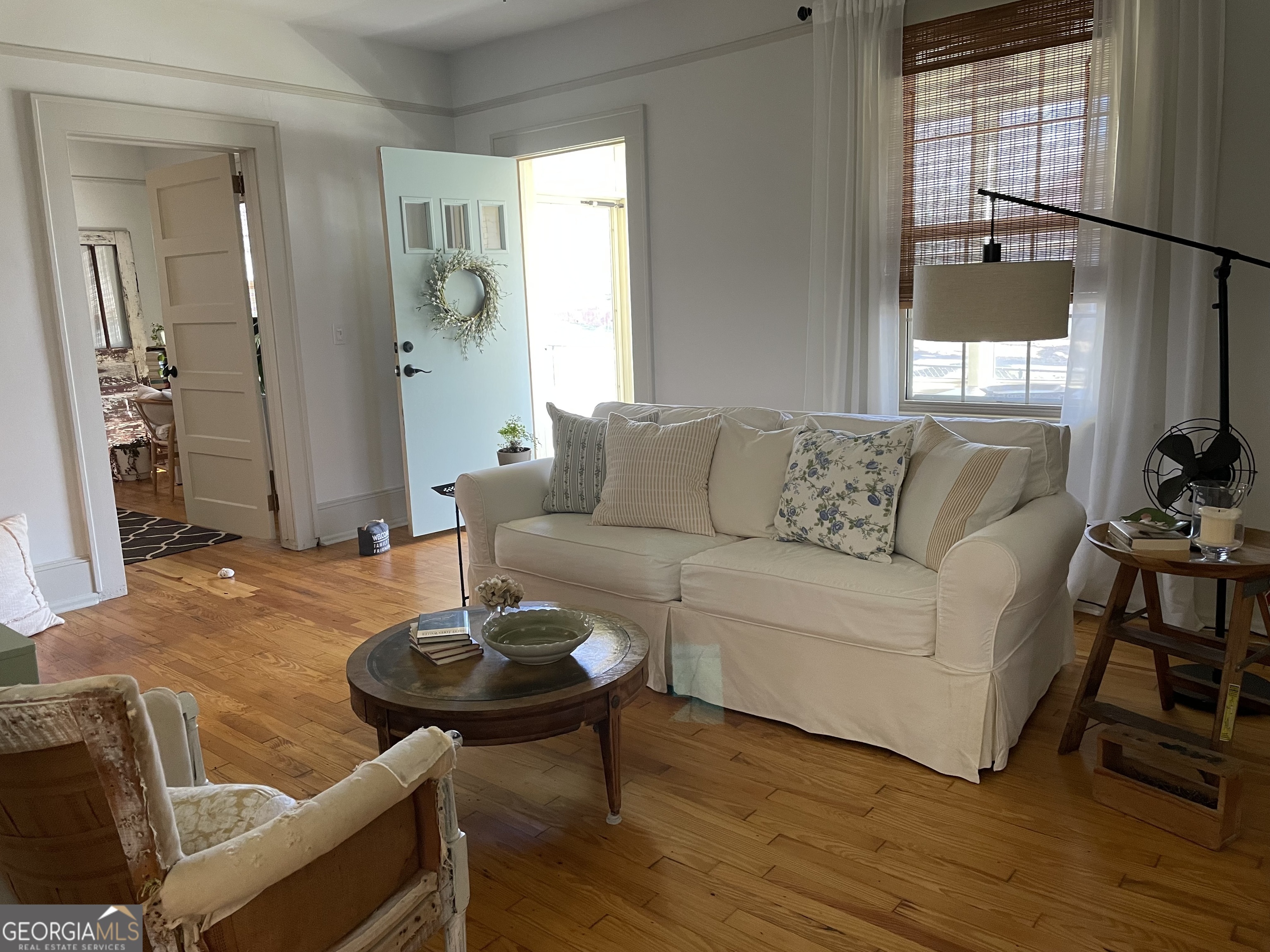 200 South Jackson Street Hartwell, GA 30643 - Photo 5 of 26 a living room with furniture and a table