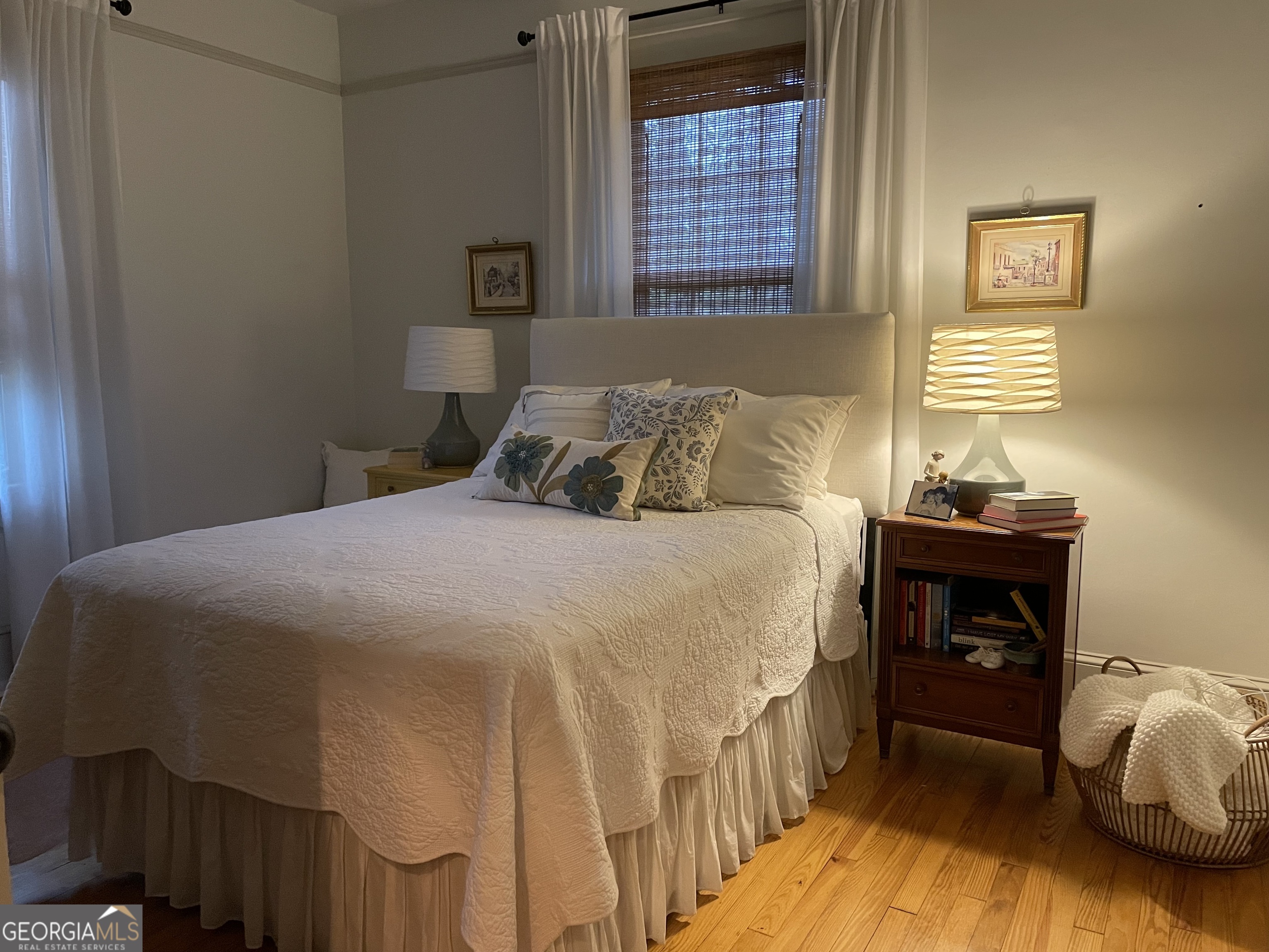 200 South Jackson Street Hartwell, GA 30643 - Photo 8 of 26 a bedroom with a bed and a window