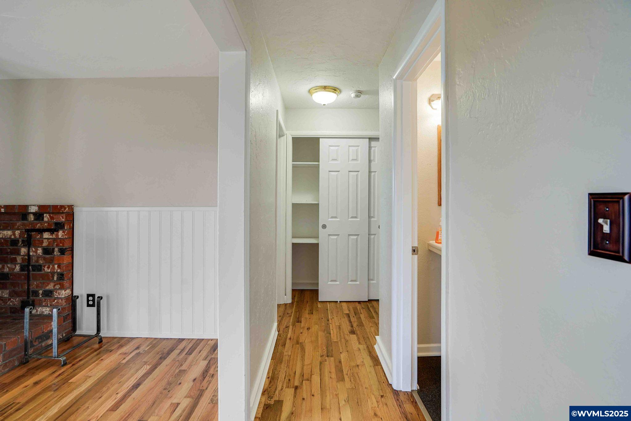4843 Hazelgreen Road Northeast Salem, OR 97305 - Photo 18 of 48 a view of a room with wooden floor and furniture