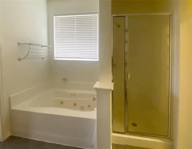 a bathroom with a bathtub