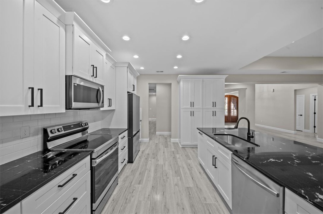 105 Bree Drive Anderson, SC 29621 - Photo 13 of 48 Culinary dreams come alive in this kitchen, featuring sleek stainless steel appliances and an expansive island.