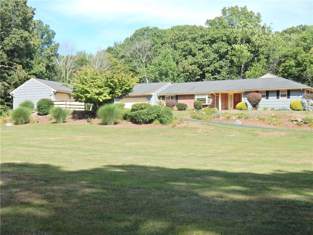 1182 Sperry Road Cheshire, CT 06410 - Photo 1 of 1 a view of a house with a yard