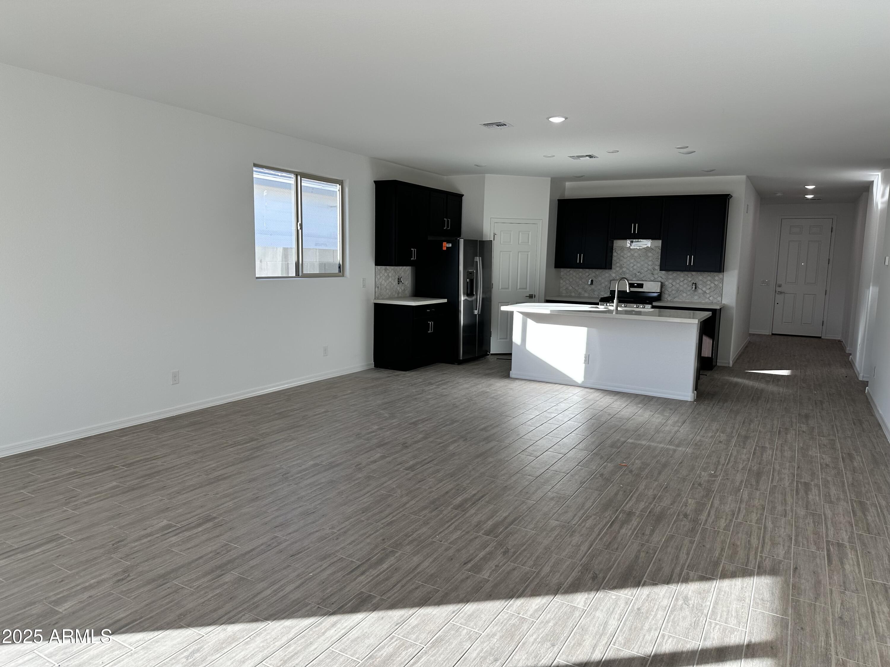 5607 West Summerside Road Laveen, AZ 85339 - Photo 31 of 49 0018_ Great Room and Kitchen