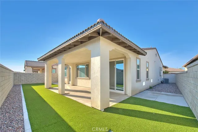 a view of swimming pool with patio