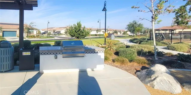a view of a swimming pool with a lounge chair
