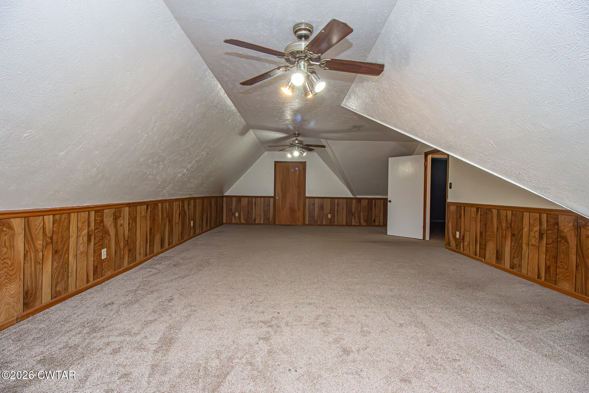 231 Tuckahoe Road Jackson, TN 38305 - Photo 22 of 39 a view of an empty room with a chandelier fan