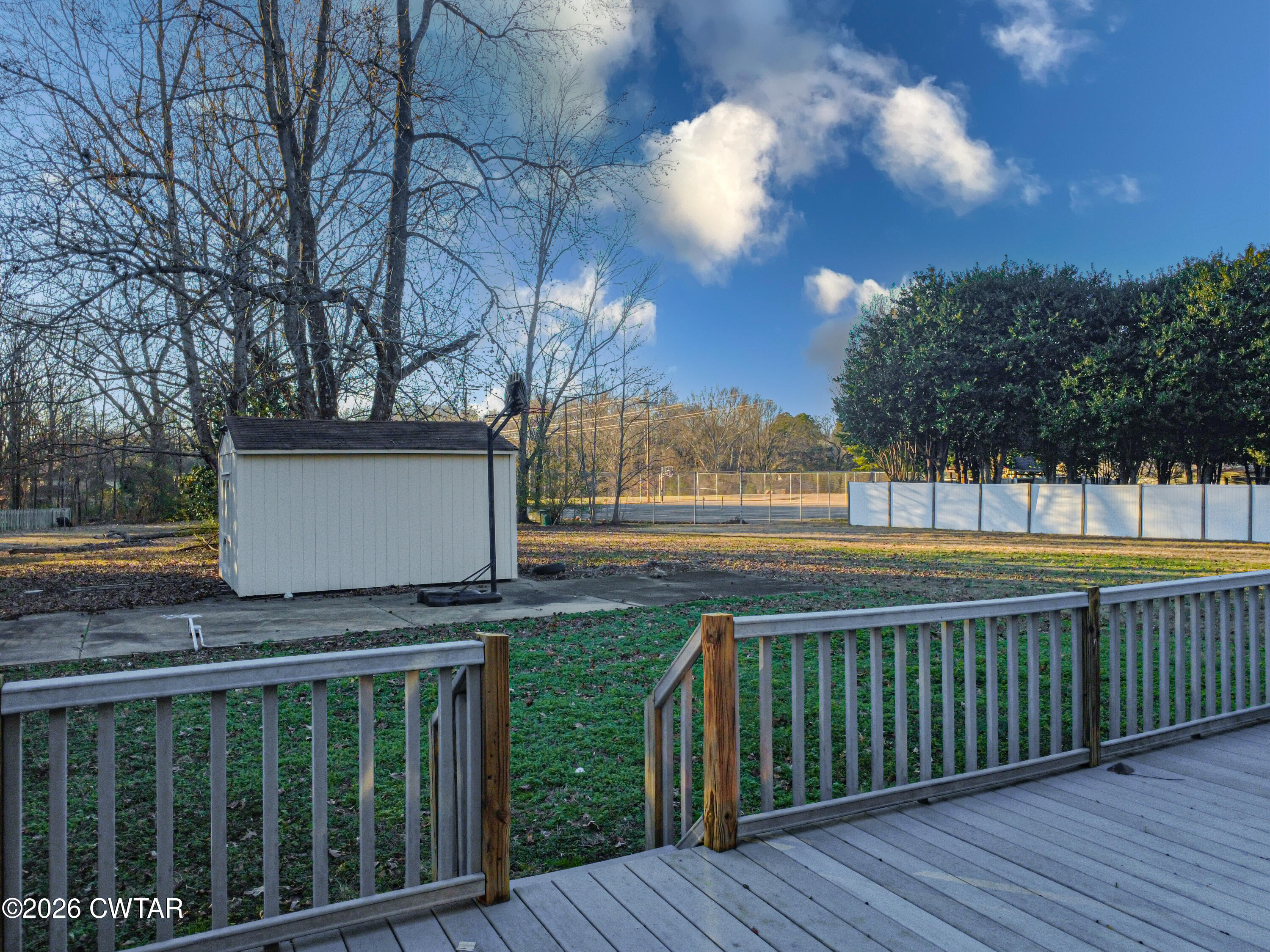 231 Tuckahoe Road Jackson, TN 38305 - Photo 30 of 39 a view of a balcony with wooden floor and fence