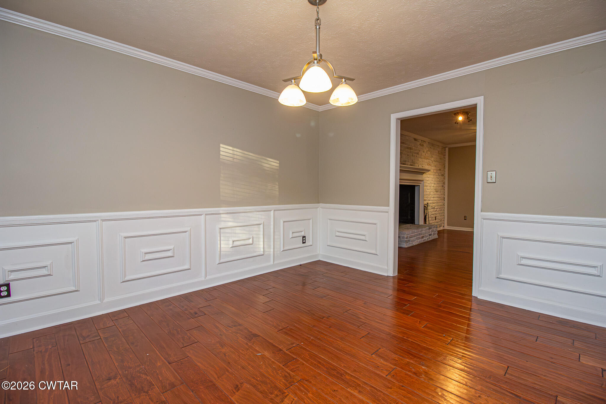231 Tuckahoe Road Jackson, TN 38305 - Photo 8 of 39 a view of an empty room with wooden floor