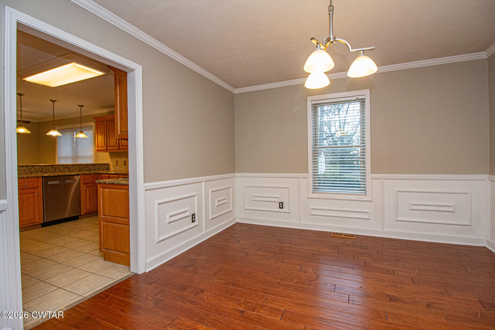 231 Tuckahoe Road Jackson, TN 38305 - Photo 9 of 39 a view of a kitchen with dishwasher and a large window