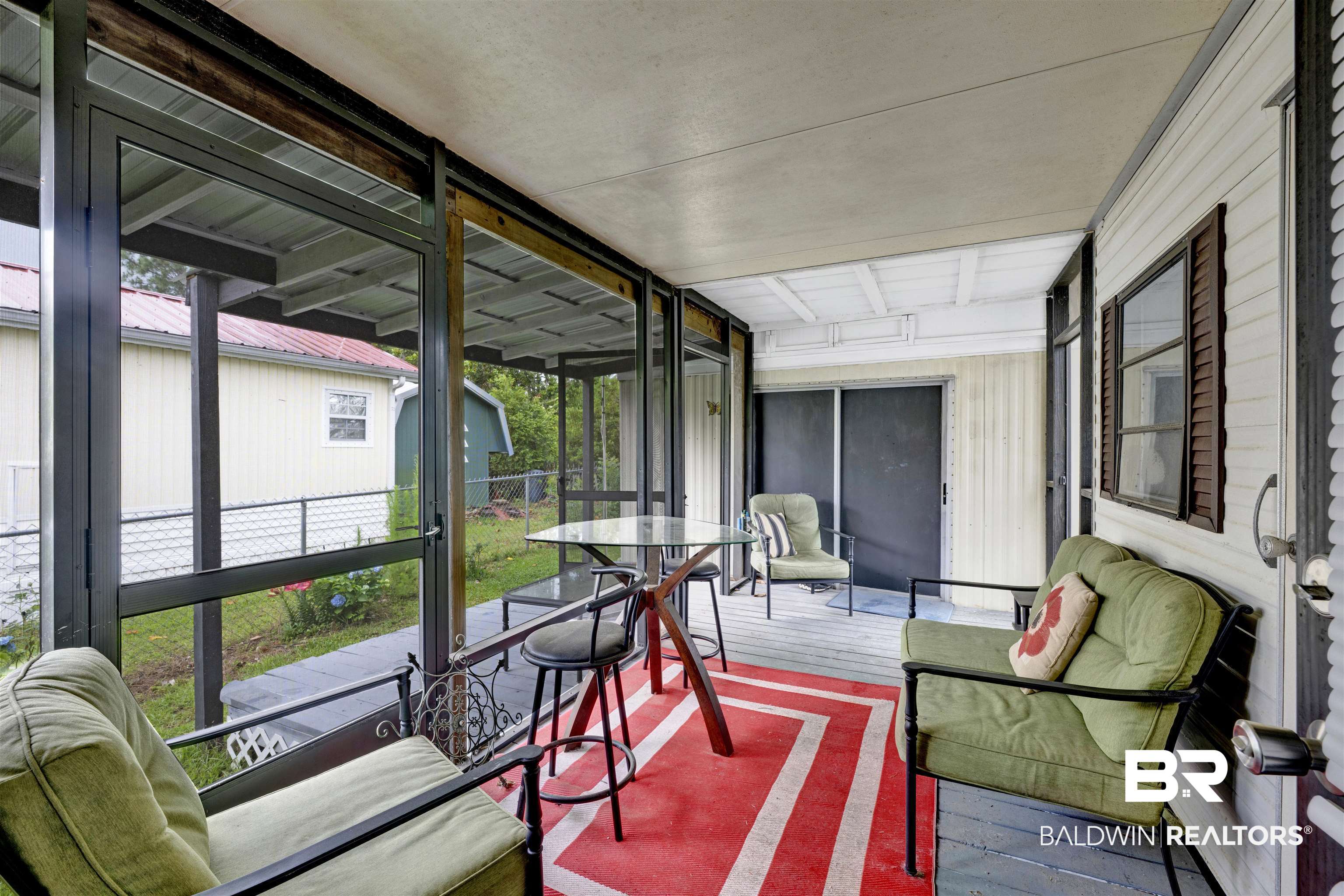 489 Elberta Loop Lillian, AL 36549 - Photo 3 of 42 Nice screened porch