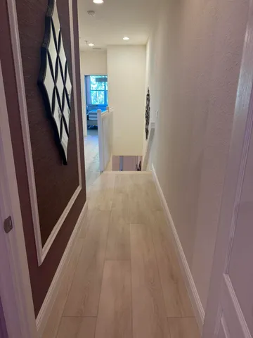 a view of hallway with stairs