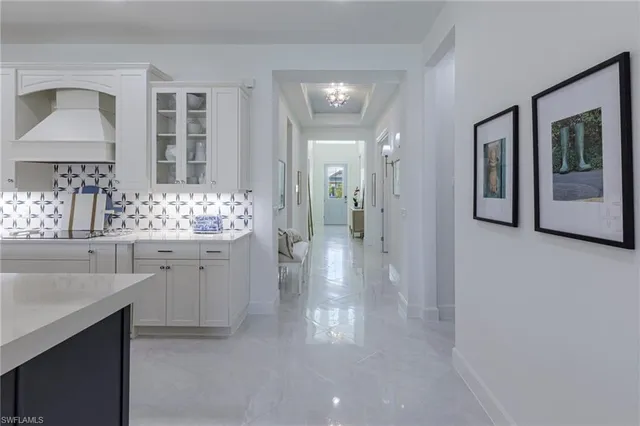 a view of a livingroom and a bathroom