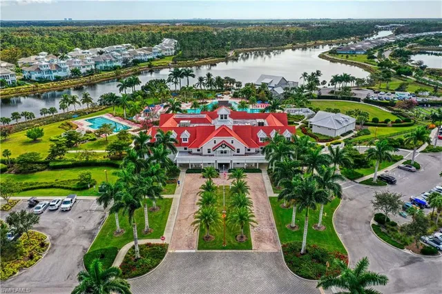 a view of swimming pool and outdoor seating