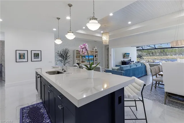 a bed room with a bed window and a flat screen tv