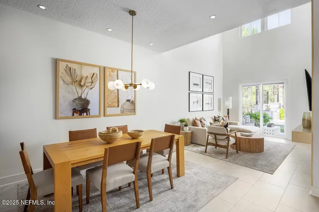 a bedroom with a bed and a mirror