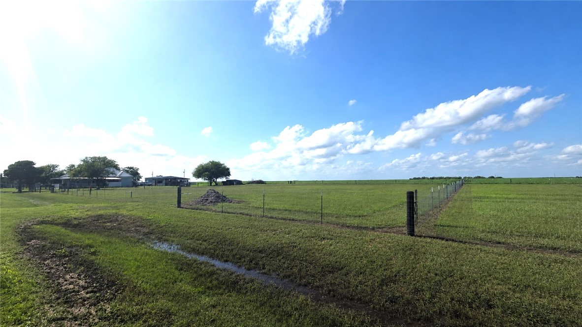 0 County Road Bishop, TX 78343 - Photo 5 of 7 a view of a field with grass and a fence