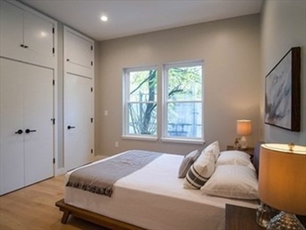 243 Condor Street, Unit 3 Boston, MA 02128 - Photo 14 of 16 a bedroom with a bed and window