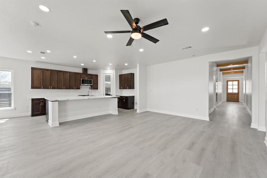 809 South Adelaide Street Terrell, TX 75160 - Photo 15 of 18 a view of kitchen with kitchen island stainless steel appliances refrigerator oven and cabinets