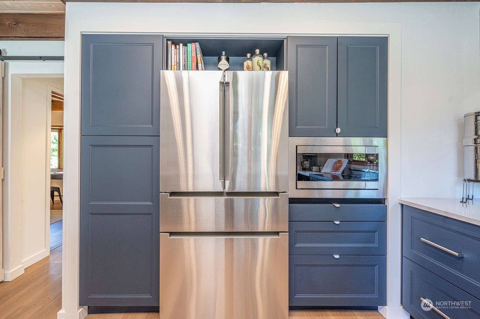 11907 103rd Avenue Southwest Vashon, WA 98070 - Photo 11 of 40 a kitchen with appliances and cabinets