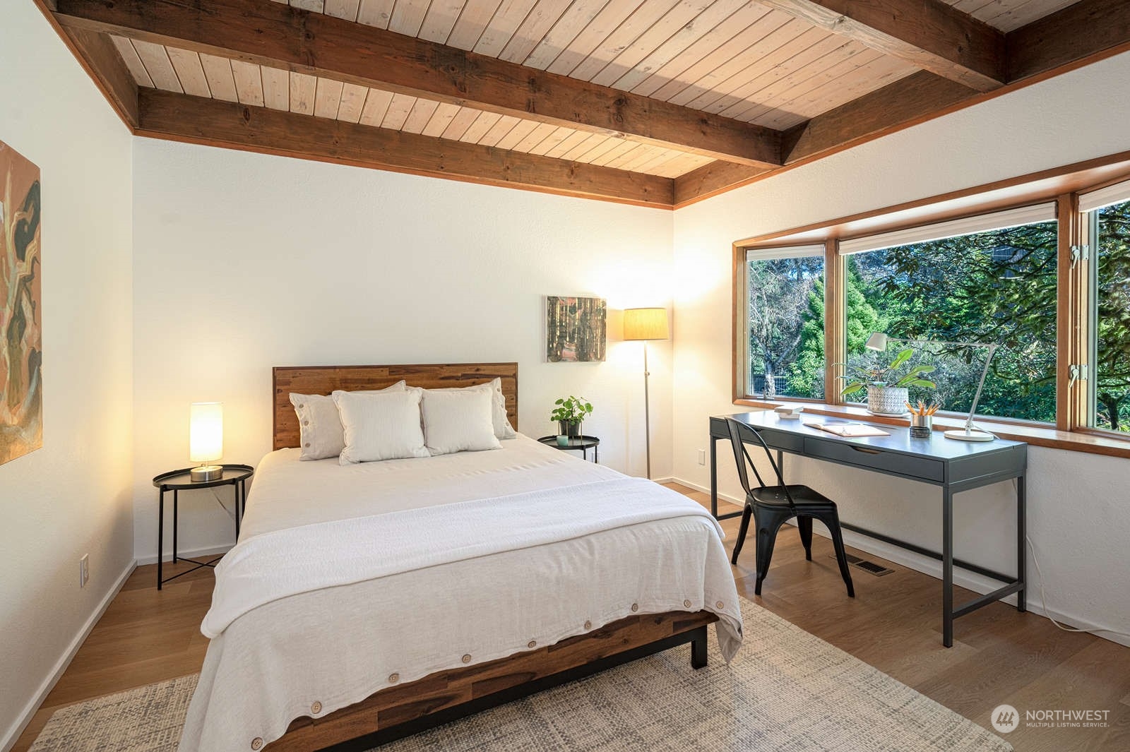 11907 103rd Avenue Southwest Vashon, WA 98070 - Photo 13 of 40 a bedroom with a bed and a table