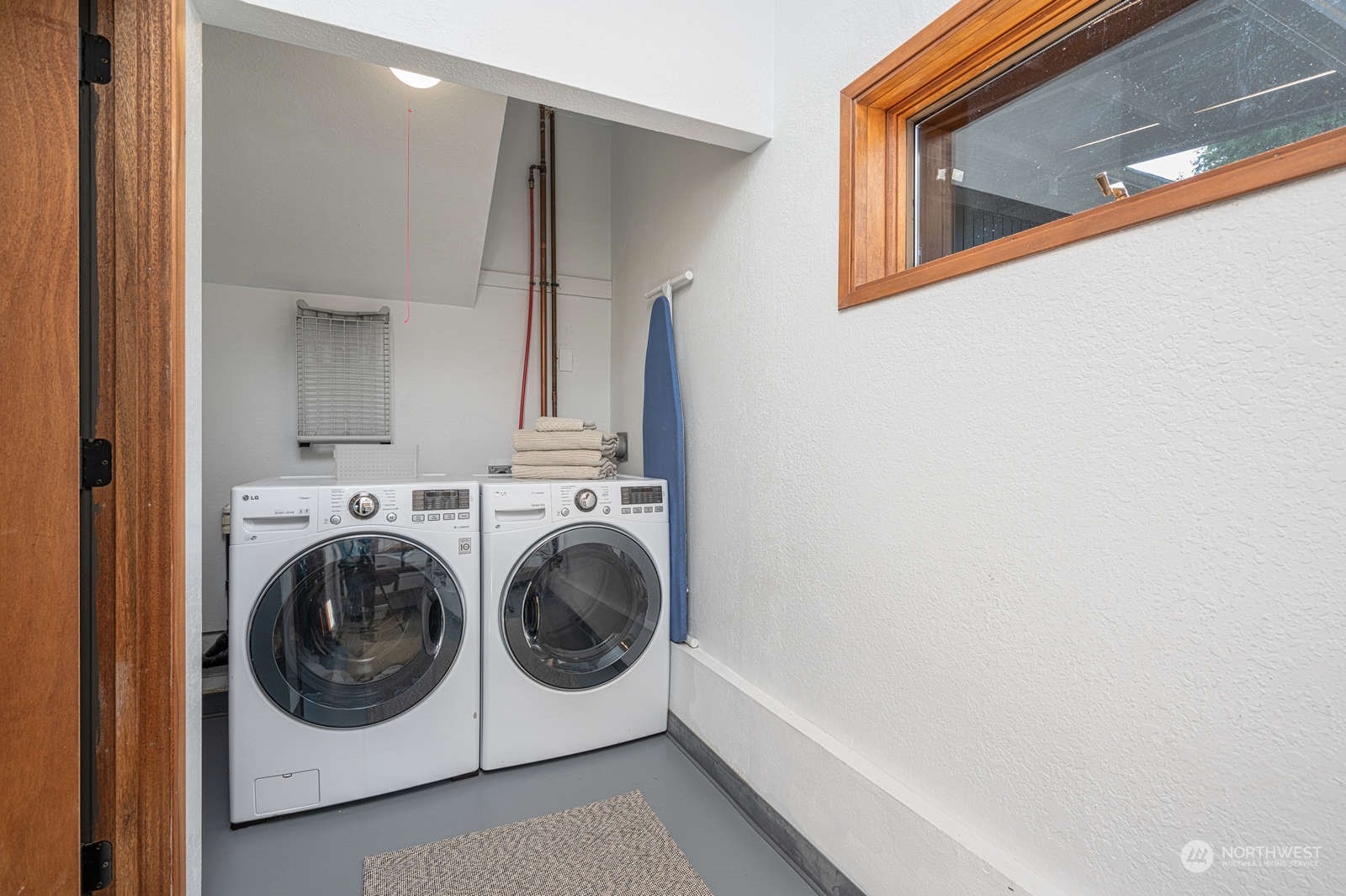 11907 103rd Avenue Southwest Vashon, WA 98070 - Photo 16 of 40 a utility room with dryer and washer