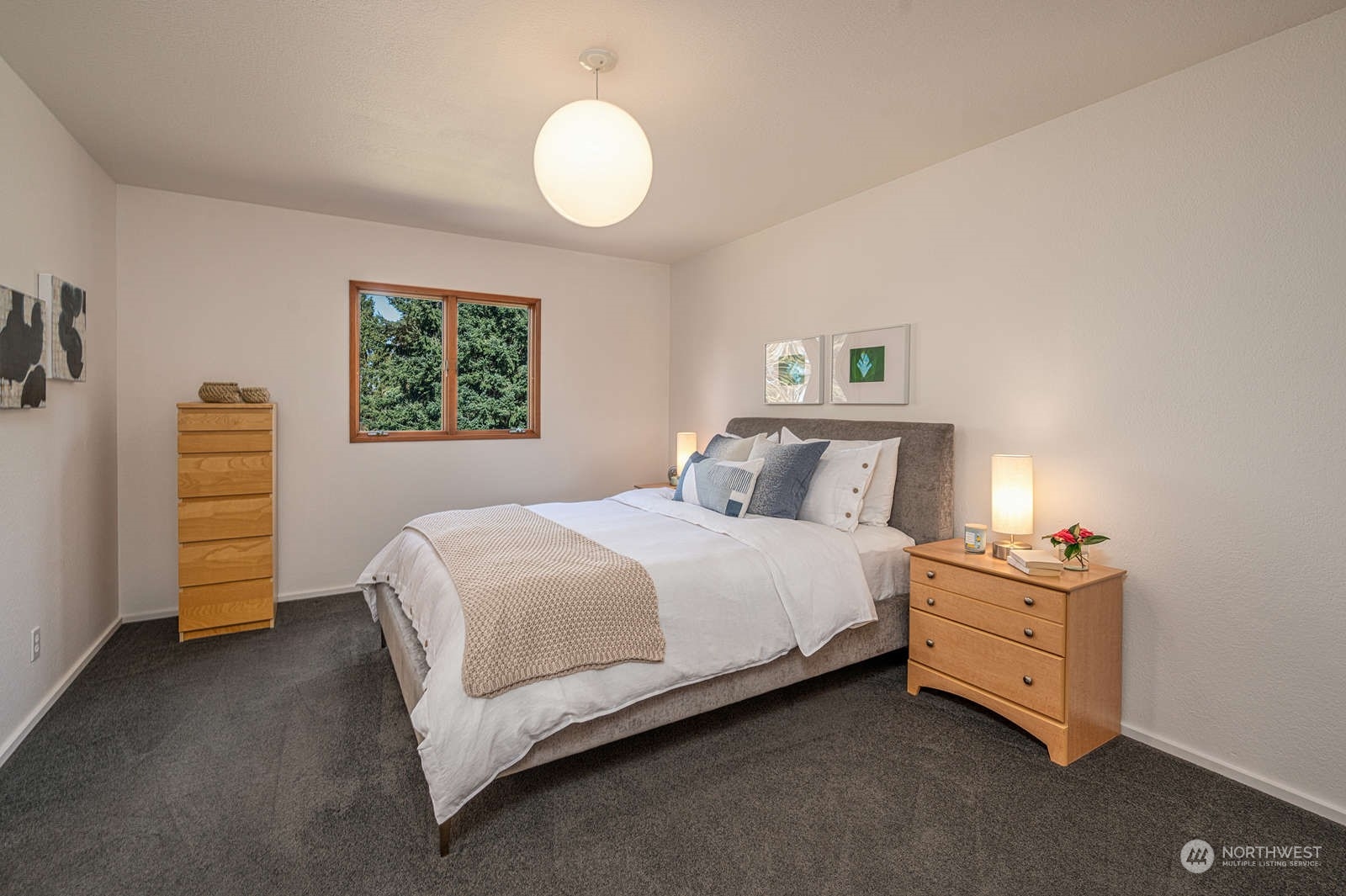 11907 103rd Avenue Southwest Vashon, WA 98070 - Photo 18 of 40 a bedroom with a bed and a window