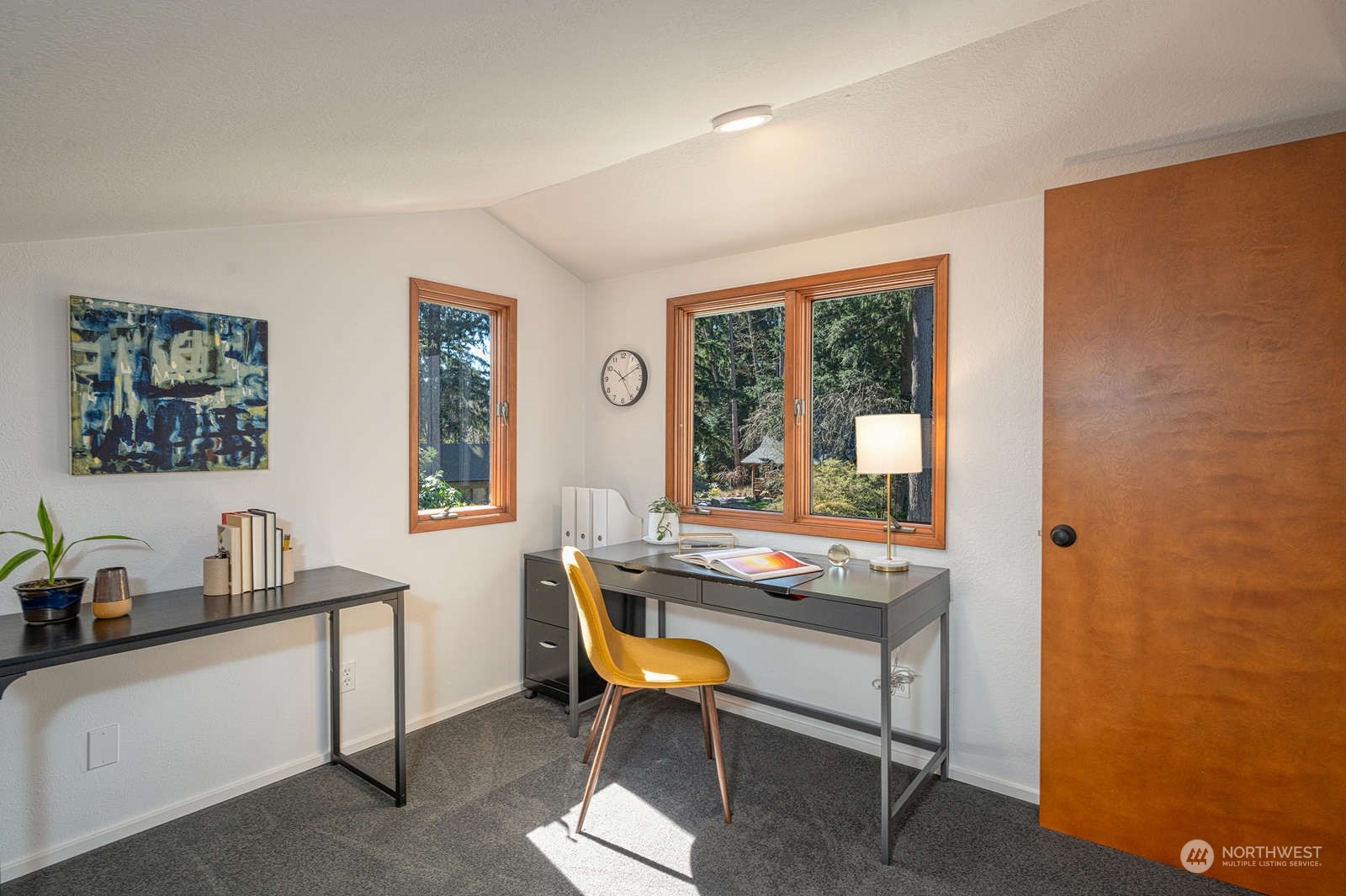 11907 103rd Avenue Southwest Vashon, WA 98070 - Photo 22 of 40 a room with a table and chairs