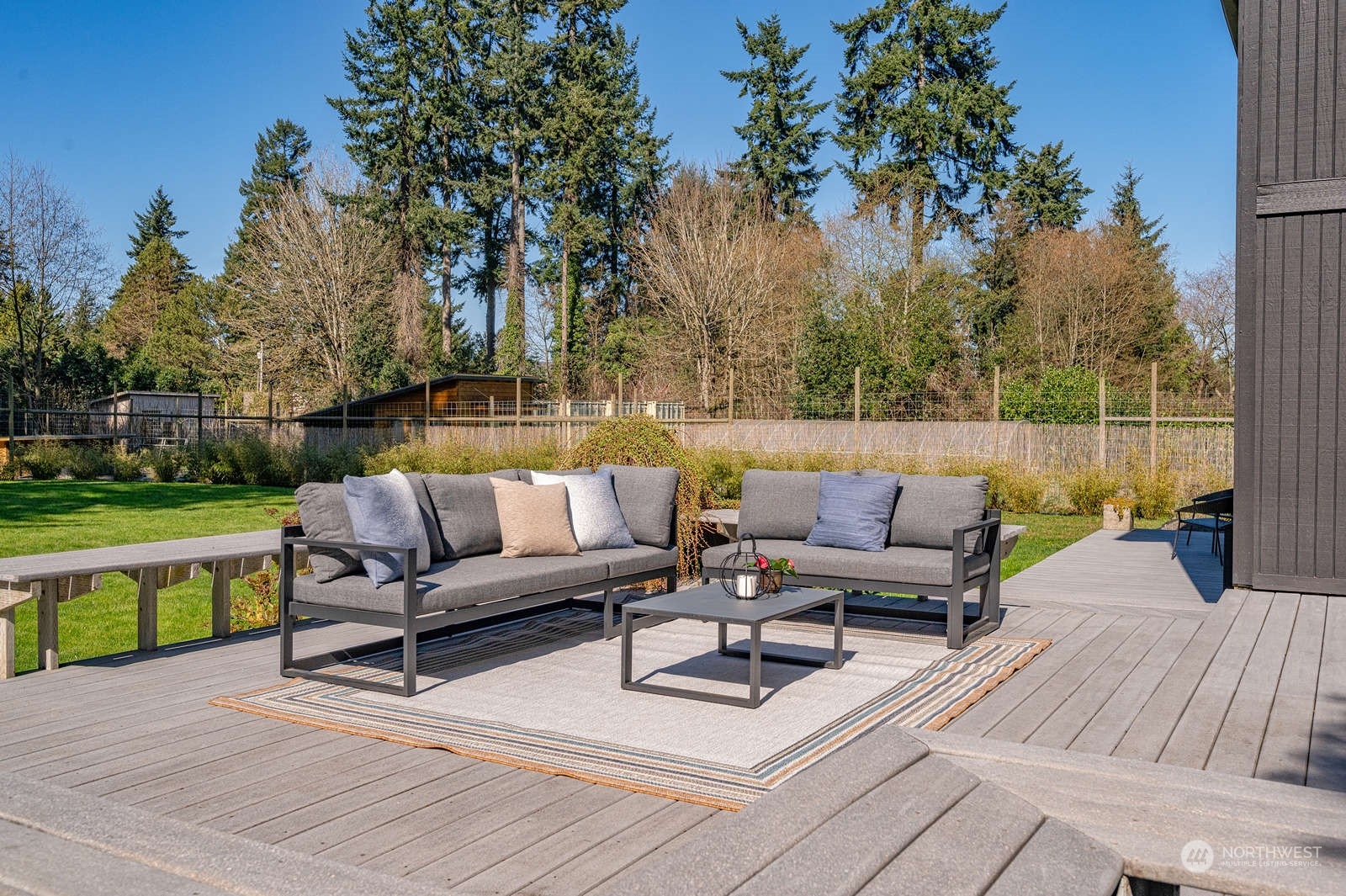 11907 103rd Avenue Southwest Vashon, WA 98070 - Photo 27 of 40 a view of sitting area with furniture and wooden floor