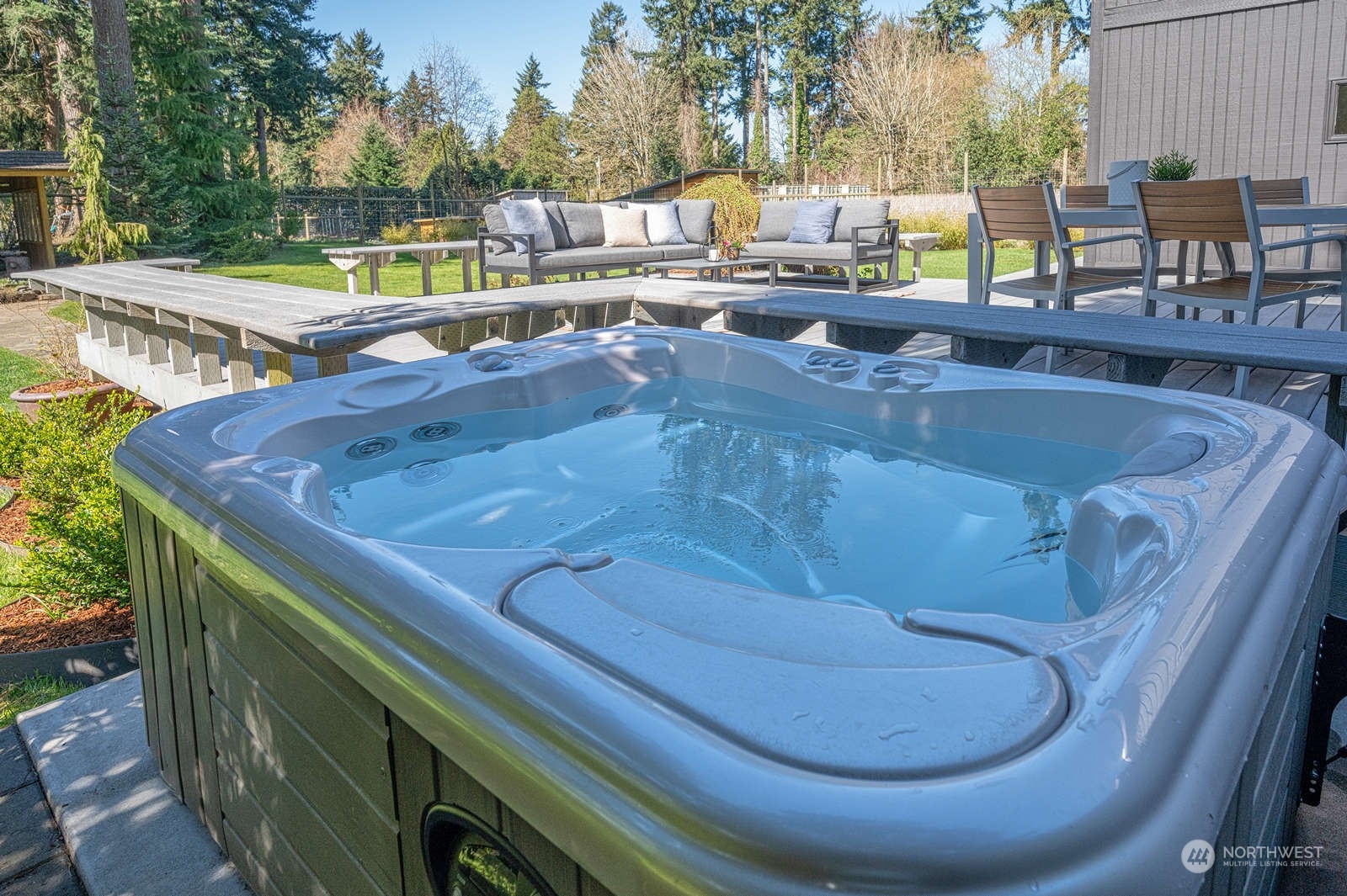 11907 103rd Avenue Southwest Vashon, WA 98070 - Photo 28 of 40 a view of a swimming pool with a patio